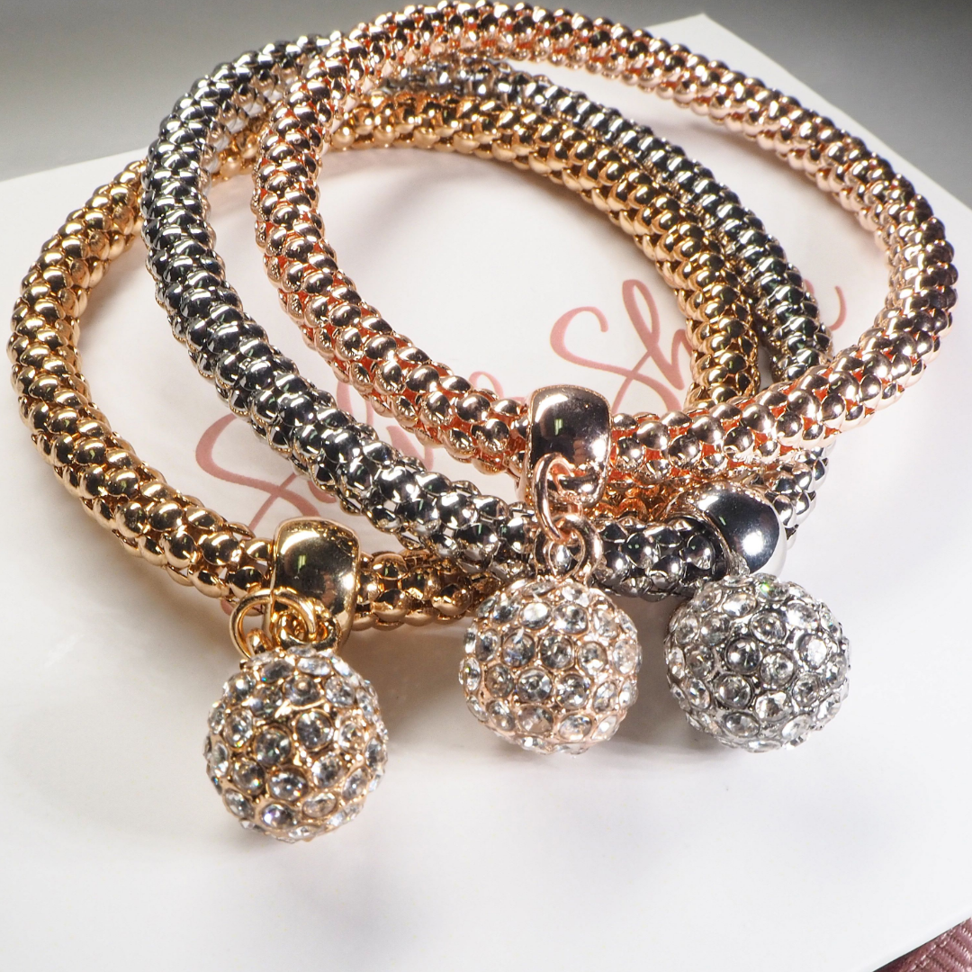 Set of Sparkling Charm Bracelets – Gold, Rose Gold, and Silver Elegance